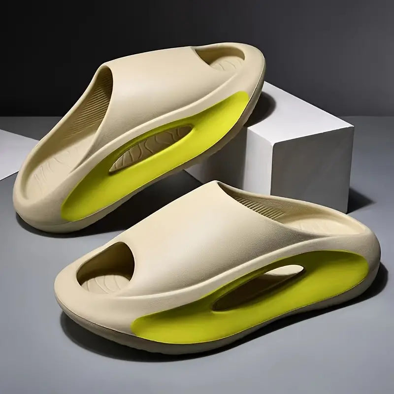 a pair of white and yellow shoes sitting on top of a table