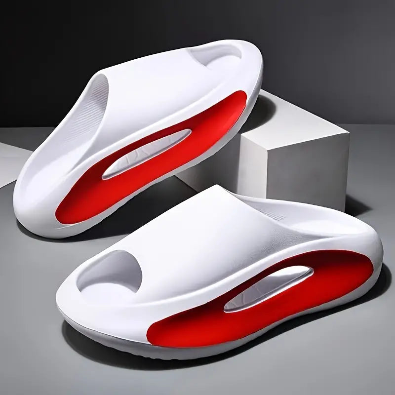 a pair of white and red shoes sitting on top of a table